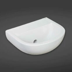 RAK Compact 380mm Doc M Basin With Horizontal Outlet And No Tap Holes - CO1005AWHA